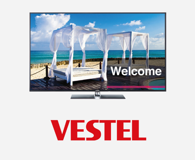 Vestel Hospitality Screens showing a bed on a tropical beach